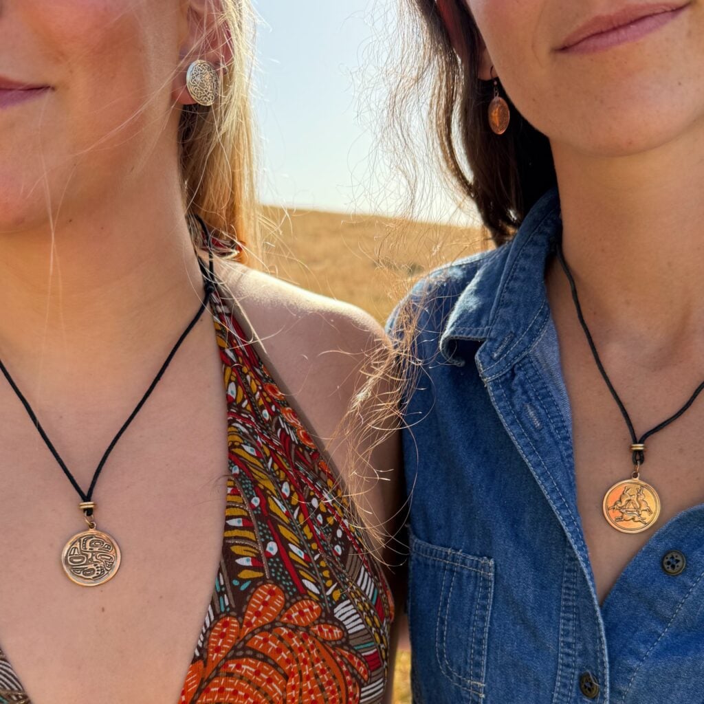 Female models wearing medallions
