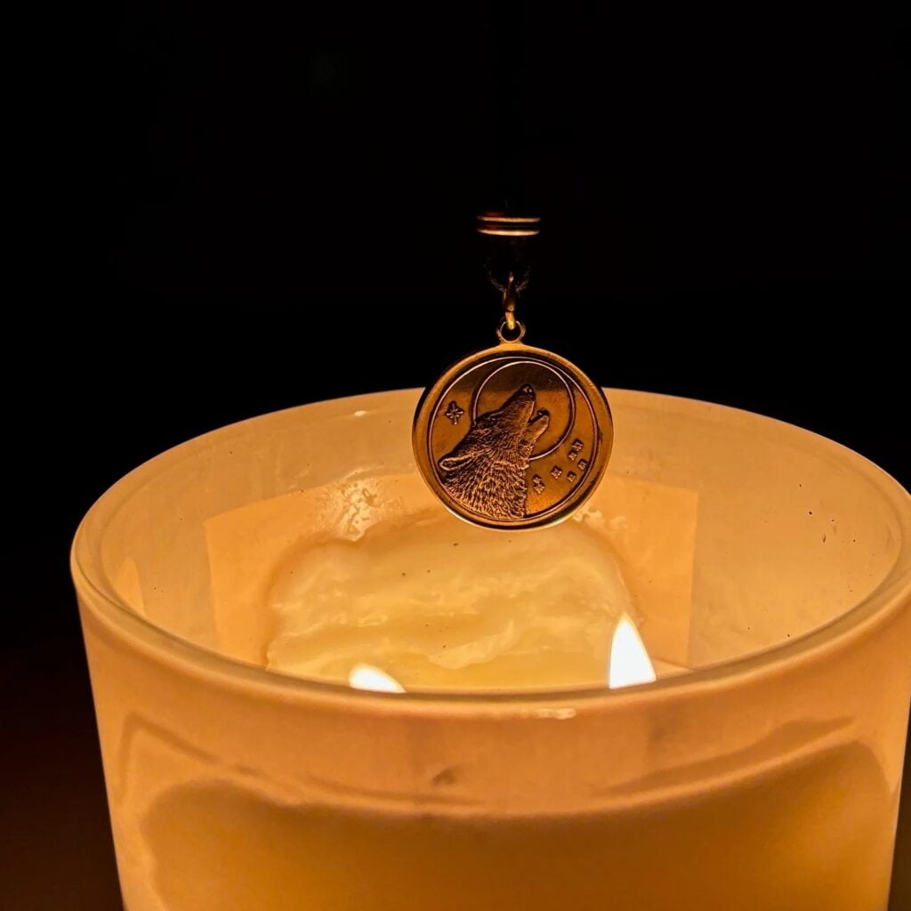 Candle light with Wolf Medallion
